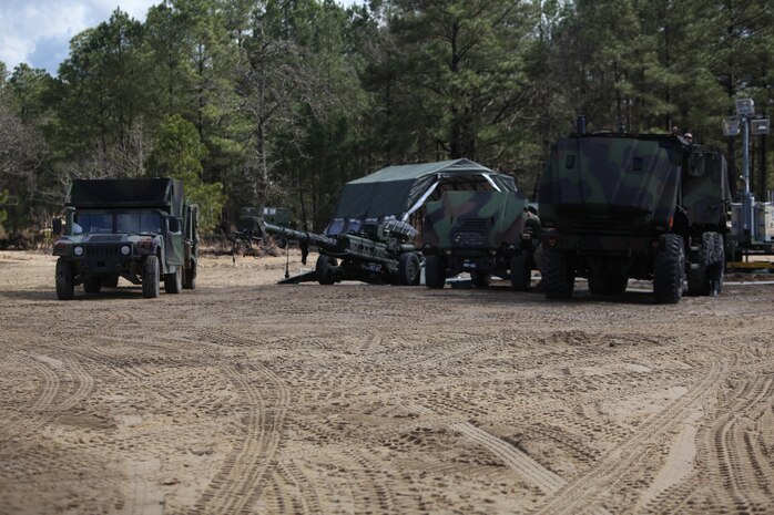 Tactical vehicles, which belong to 10th Marine Regiment, 2nd Marine Division, await repairs in front of the logistics combat element, or LCE, detachment from 2nd Marine Logistics Group March 17, 2013, during Rolling Thunder, a joint training exercise at Fort Bragg, N.C. The regiment depended on support from the LCE such as vehicle recovery, maintenance and resupply missions as it carried out its 19-day training. 