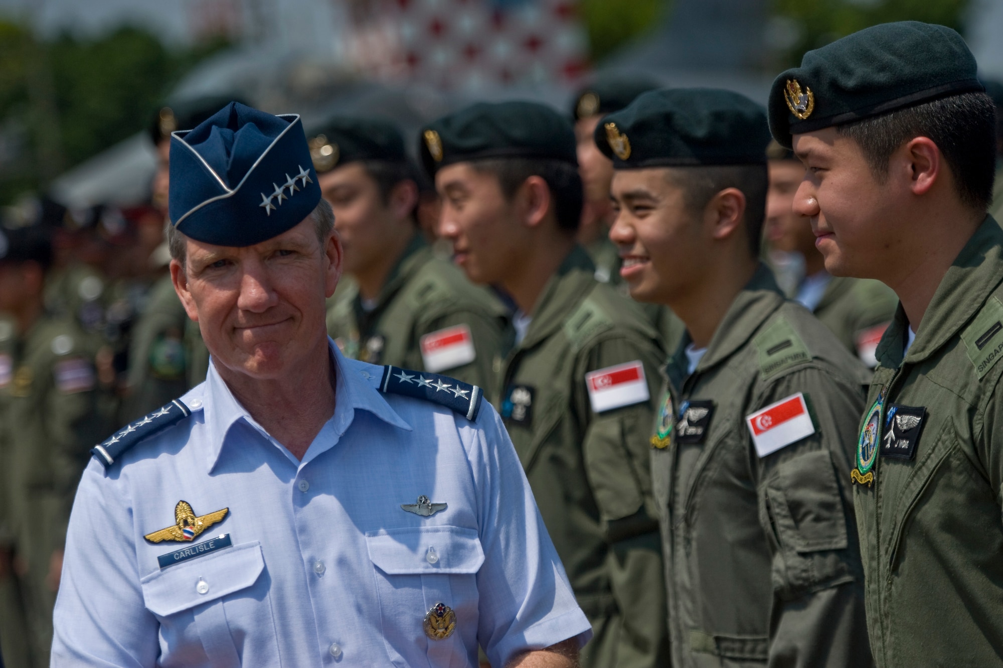 U.S. Air Force Gen. Hawk Carlisle, commander of Pacific Air Forces, departs the closing ceremony for Cope Tiger 13 at Korat Royal Thai Air Force Base, Thailand, March 22, 2013. More than 300 U.S. service members are participating in CT13, which offers an unparalleled opportunity to conduct a wide spectrum of large force employment air operations and strengthen military-to-military ties with two key partner nations, Thailand and Singapore. (U.S. Air Force photo/2nd Lt. Jake Bailey)