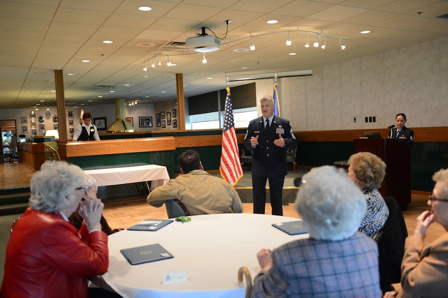 Chief Master Sgt. Gordon Drake, 62nd Airlift Wing command chief, thanks the widows of Vietnam veterans during a ceremony honoring them March 23, 2012 at Joint Base Lewis-McChord, Wash. The 62nd Airlift Wing honored the widows by presenting them with a certificate of honor from the Department of Defense. (U.S. Air Force photo/Airman 1st Class Jacob Jimenez) 

