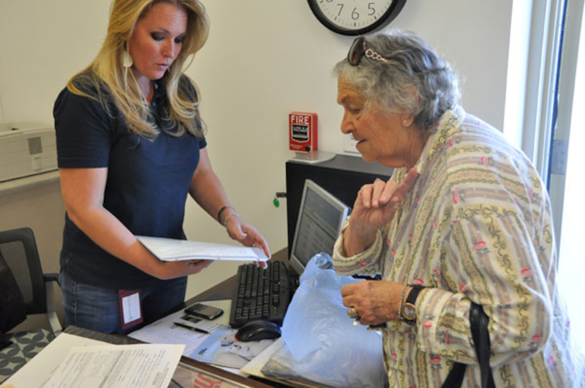 Catherine Pritchett,left, senior assistant to the Inland Valley Development Agency executive director, checks in items donated to the museum.
