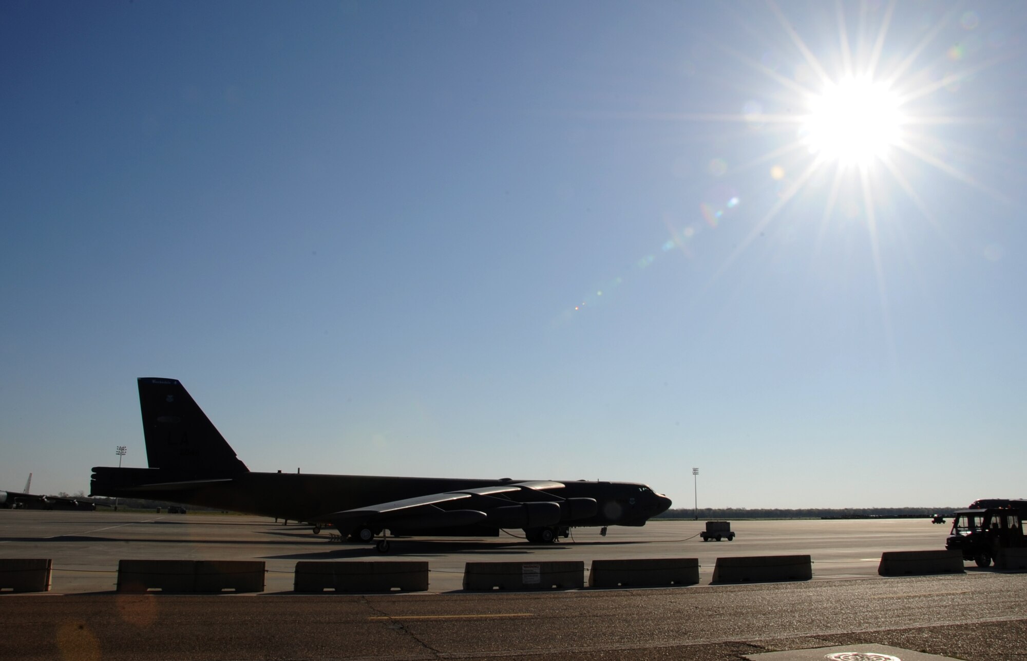 A B-52H Stratofortress undergoes take-off preparations on Barksdale Air Force Base, La., March 25. If there are no problems during startup, the crew chiefs begin to taxi the aircraft to the runway for take-off. The B-52 is capable of flying 7,652 nautical miles or 8,800 miles without being refueled by another aircraft. The B-52 is classified as a long-range, heavy bomber and is capable of carrying 70,000 pounds of mixed ordnance. (U.S. Air Force photo/Airman 1st Class Benjamin Gonsier)
