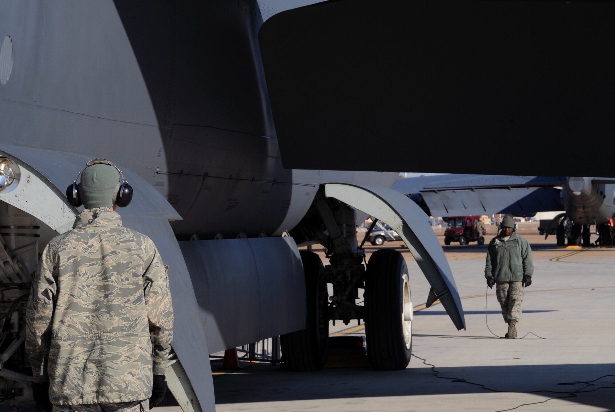 Barksdale crew chiefs perform their ground checks for a B-52H Stratofortress take-off on Barksdale Air Force Base, La., March 25. The crew chiefs focus on the exterior of the aircraft while the aircrew focuses on the interior. The aircrew and crew chiefs are constantly communicating to ensure all take-off procedures are executed correctly. (U.S. Air Force photo/Airman 1st Class Benjamin Gonsier)

