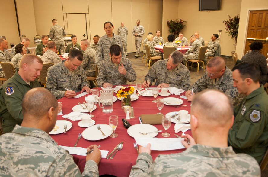 Base Leadership attend the Air Force Assistance Fund kick-off breakfast March 25, 2013, at Moody Air Force Base, Ga. Leadership came together, ate breakfast and gave their donations to the AFAF. (U.S. Air Force Photo by Airman Paul Francis/Released)
