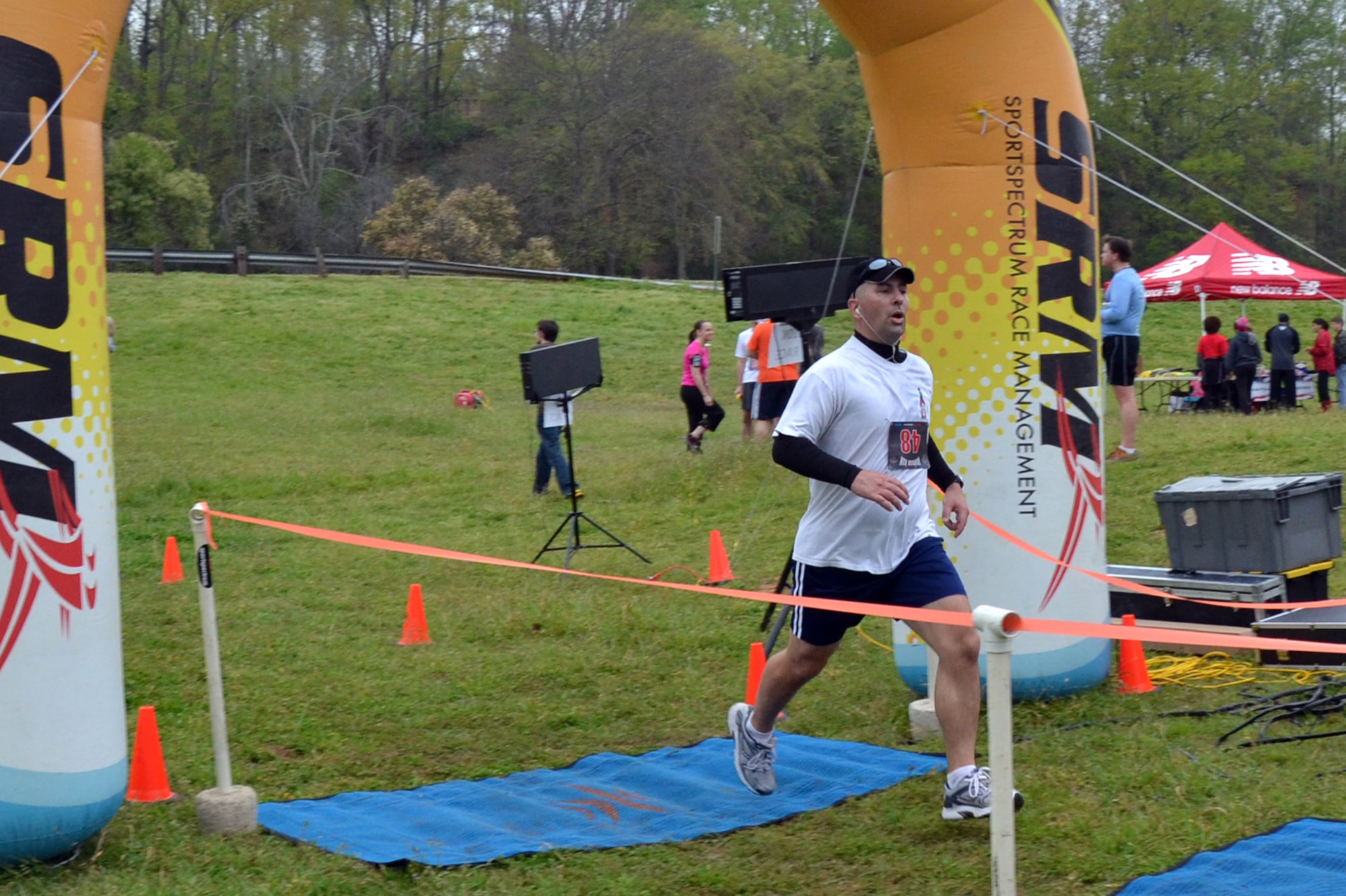 Mike Kimbrel (#48) finishes the 10K portion of the Veteran’s Memorial Warrior Run and Healthwalk at Veteran’s Park in Shreveport, La., March 23, 2013. Kimbrel is assigned to the 917th Fighter Group at Barksdale Air Force Base, La., He finished the race with an official time of 53.12. He placed 28th Overall in the 10K race. The event consisted of a 10K/5K Walk and Run. After the run there was musical entertainment, Jambalaya and other refreshments. (Courtesy photo by Eva Klimentova)