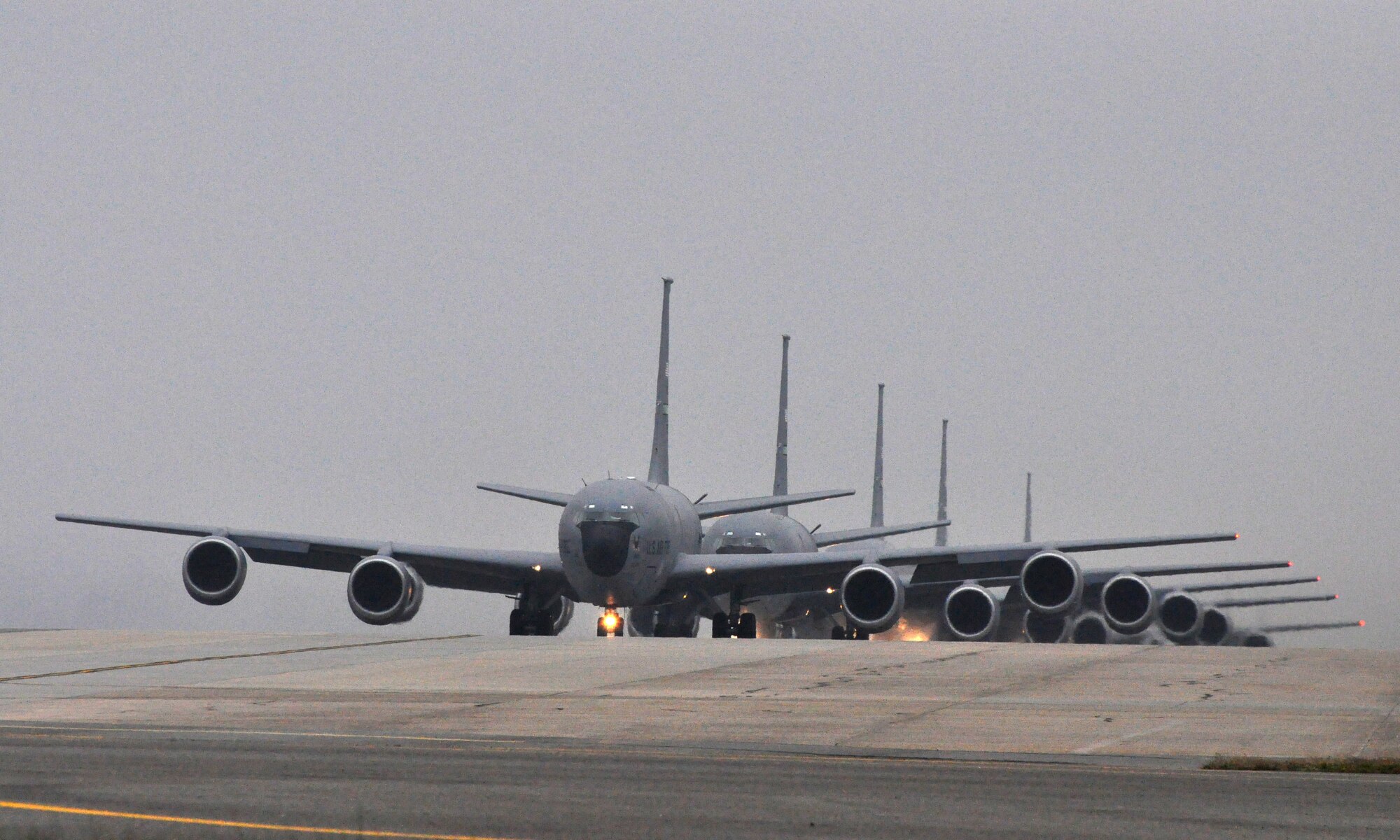 Seven KC-135R Stratotankers line the ramp at Seymour Johnson Air Force Base on a dismal day in mid-March. The 916th Air Refueling Wing is planning for another operational inspection set for early May. (USAF photo by MSgt. Wendy Lopedote, 916ARW/PA)