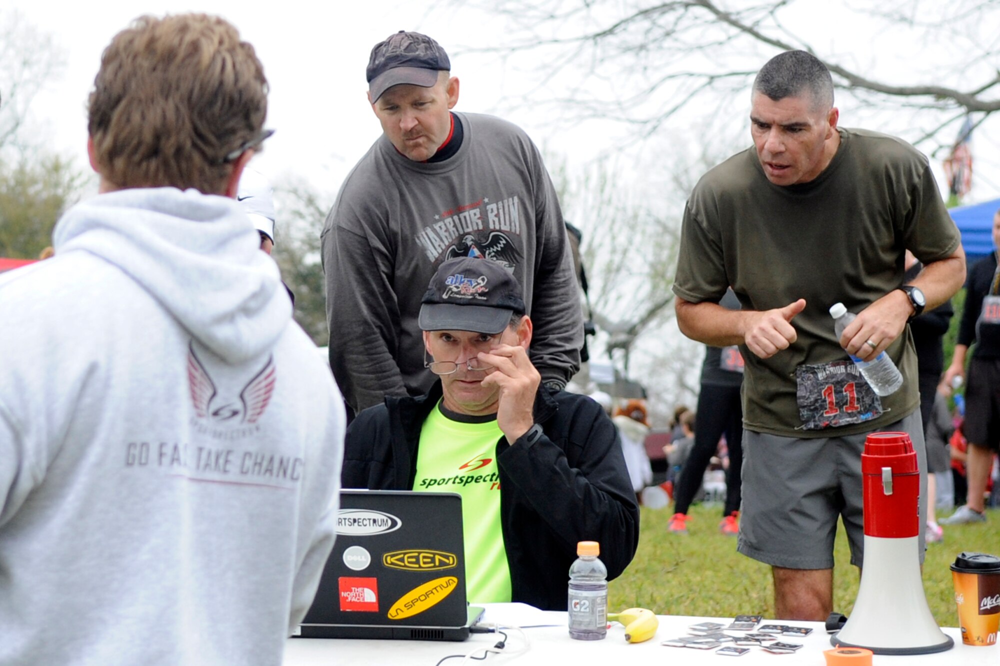 James Marks (#223) 917th Operations Support Flight and Kenneth Rose, (#11) 307th Maintenance Group commander, check their times after competing in the Veteran’s Memorial Warrior Run and Healthwalk at Veteran’s Park in Shreveport, La., March 23, 2013. Rose, won his age group (45 to 54) with an official time of 41:37. He placed 3rd Overall in the 10K race. Marks finished the 5K run with an official time of 27:47, and placed 36th Overall in the 5K race. The event consisted of a 10K/5K Walk and Run. After the run there was musical entertainment, Jambalaya and other refreshments. (U.S. Air Force photo by Master Sgt. Jeff Walston)
