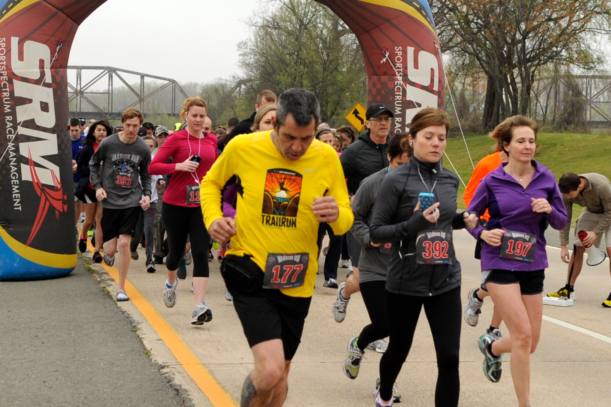 Erika Cordes (#115 - red shirt) starts the 5K portion of the Veteran’s Memorial Warrior Run and Healthwalk at Veteran’s Park in Shreveport, La., March 23, 2013. Cordes, who is assigned to the 307th Maintenance Squadron at Barksdale Air Force Base, La., finished the race with an official time of 27:22. She placed 32nd Overall in the 5K race. The event consisted of a 10K/5K Walk and Run. After the run there was musical entertainment, Jambalaya and other refreshments. (U.S. Air Force photo by Master Sgt. Jeff Walston)