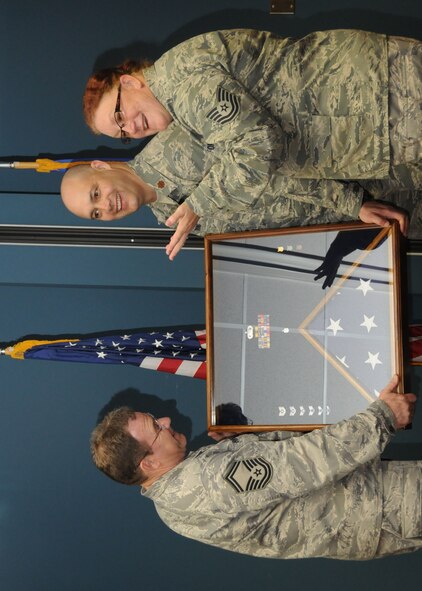 Tech. Sgt. Frances Post (far right) retired from the 916th Air Refueling Wing Maintenance Group during the March drill weekend. See the list of newcomers, promotions and quarterly award winners here. (USAF photo by TSgt. Scotty Sweatt, 916ARW/PA)