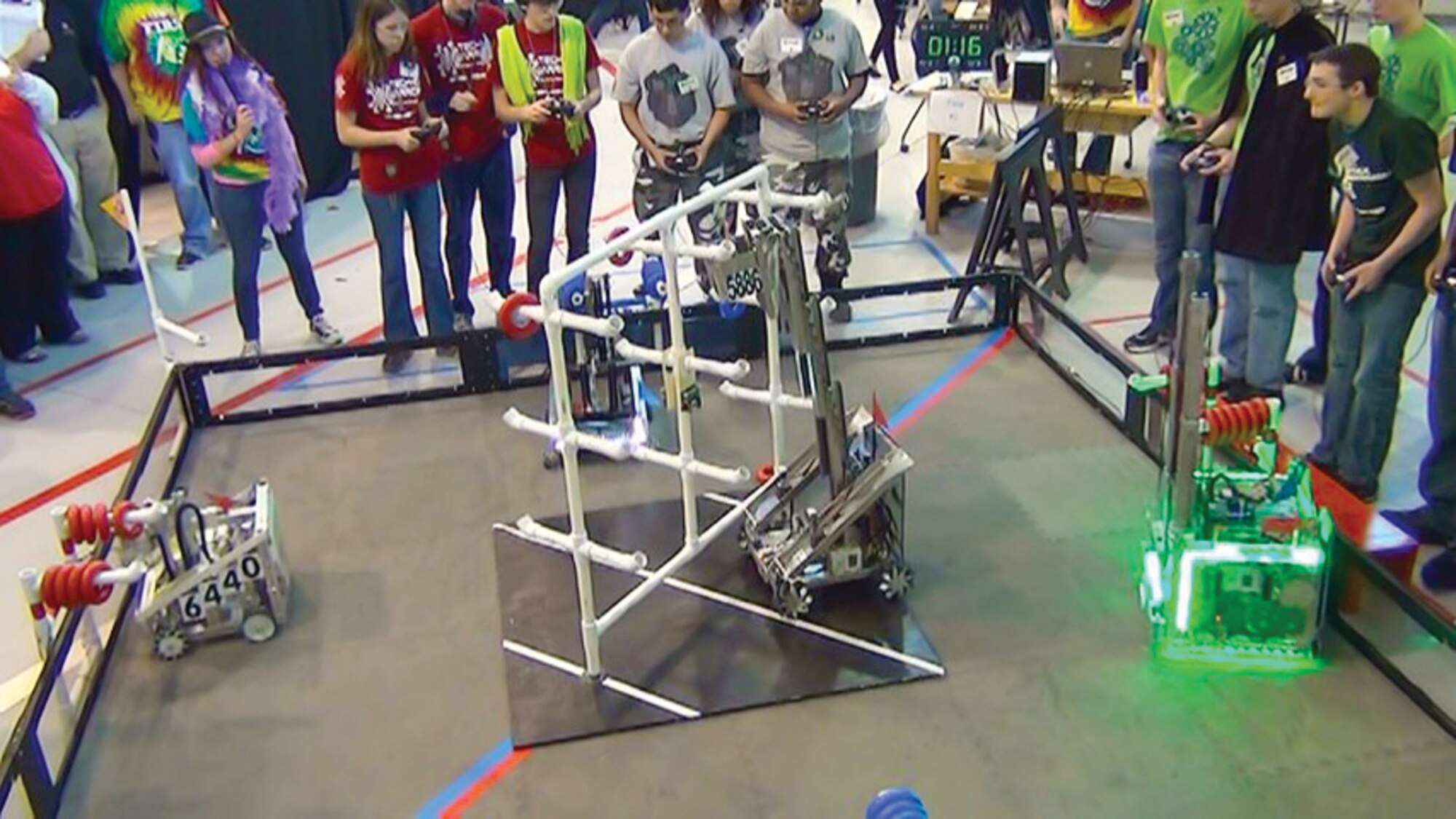 Team R.P.G.’s robot, center, tries to complete a task during a challenge. (Photo provided)