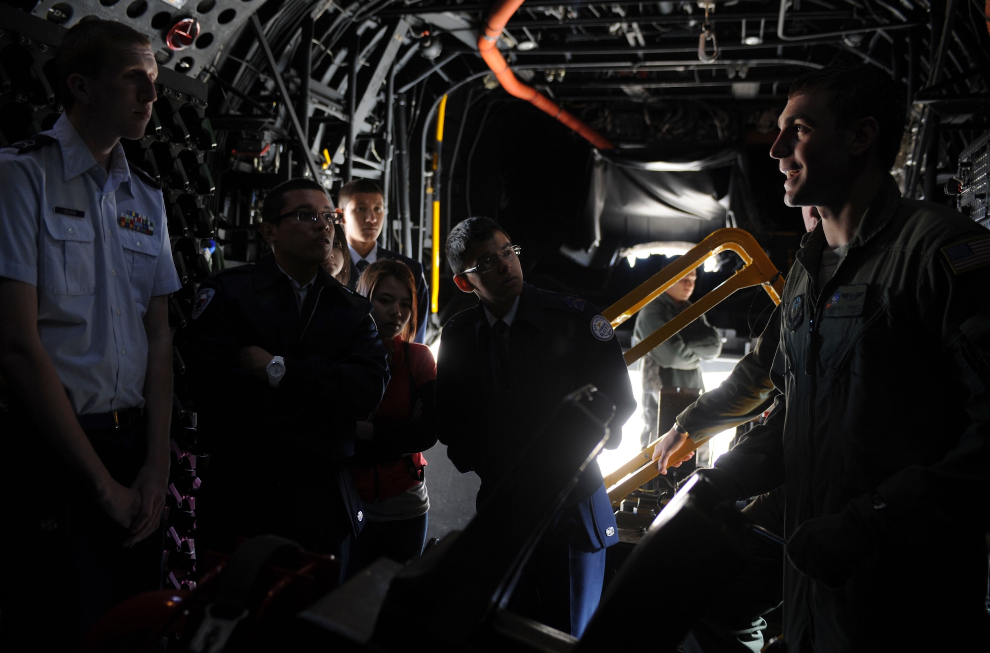 U.S. Air Force Airman 1st Class Andrew Portz, 16th Special Operations Squadron, educates members of the Amarillo Air Force Junior Reserve Officer Training Corps on military life during a tour of Cannon Air Force Base, N.M., March, 20, 2013. Air Force JROTC is the high school variation of the college ROTC program where students can experience military training while achieving their high school education. (U.S. Air Force photo/Airman 1st Class Ericka Engblom)