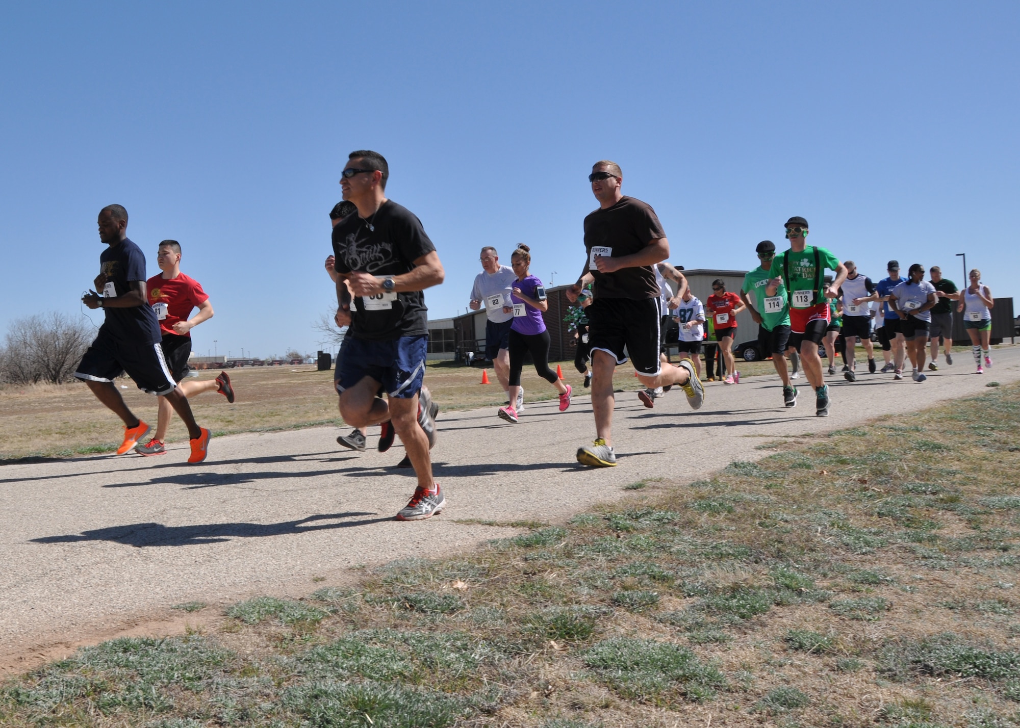 GOODFELLOW AIR FORCE BASE, Texas – Participants for the St. Patrick’s Day Run start the race at the starting in on the Kiowa Trail here March 15. Each competitor challenged a three and a half mile run. (U.S. Air Force photo/ Airman 1st Class Joshua Edwards)