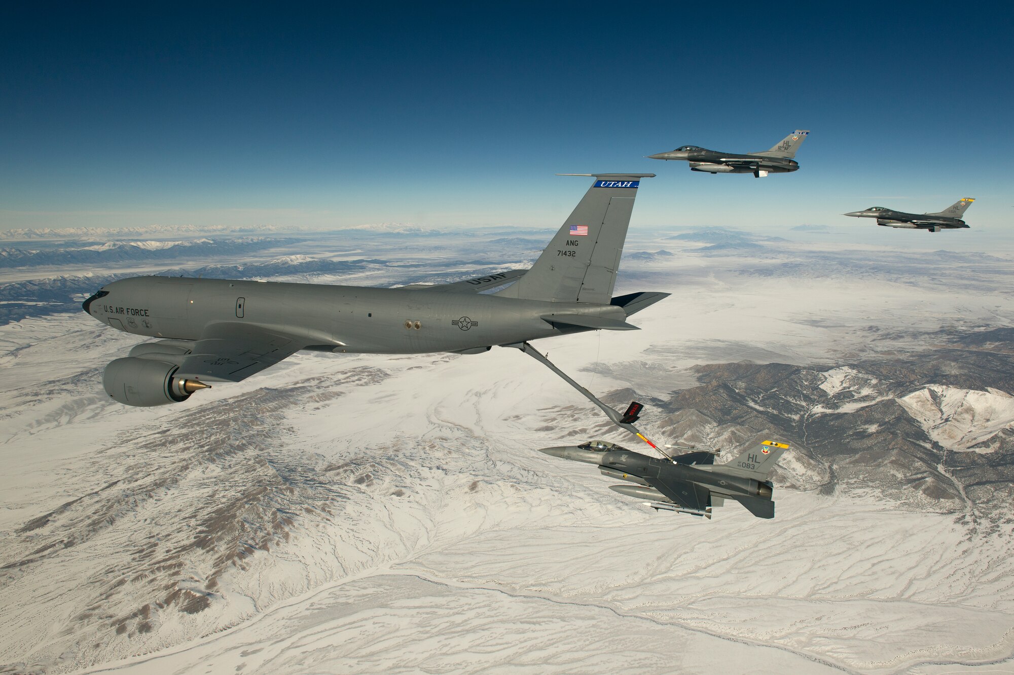 Capt. Jared White, an F-16 Fighting Falcon pilot from the 421st Fighter Squadron, Hill Air Force Base, Utah, maneuvers into position to receive fuel from a Utah National Guard KC-135 tanker en route to San Diego, Calif., Jan. 18, 2013. A cadre of Hill-based 388th Fighter Wing pilots will be operating out of Marine Corps Air Station Miramar to provide close air support for the U.S Marine Corps Integrated Training Exercise (ITX) 13-1 formerly known as Mojave Viper. This joint training operation, executed at 29 Palms, prepares Marine battalions for deployment to Afghanistan. (USAF Photo by Master Sgt. Ben Bloker)