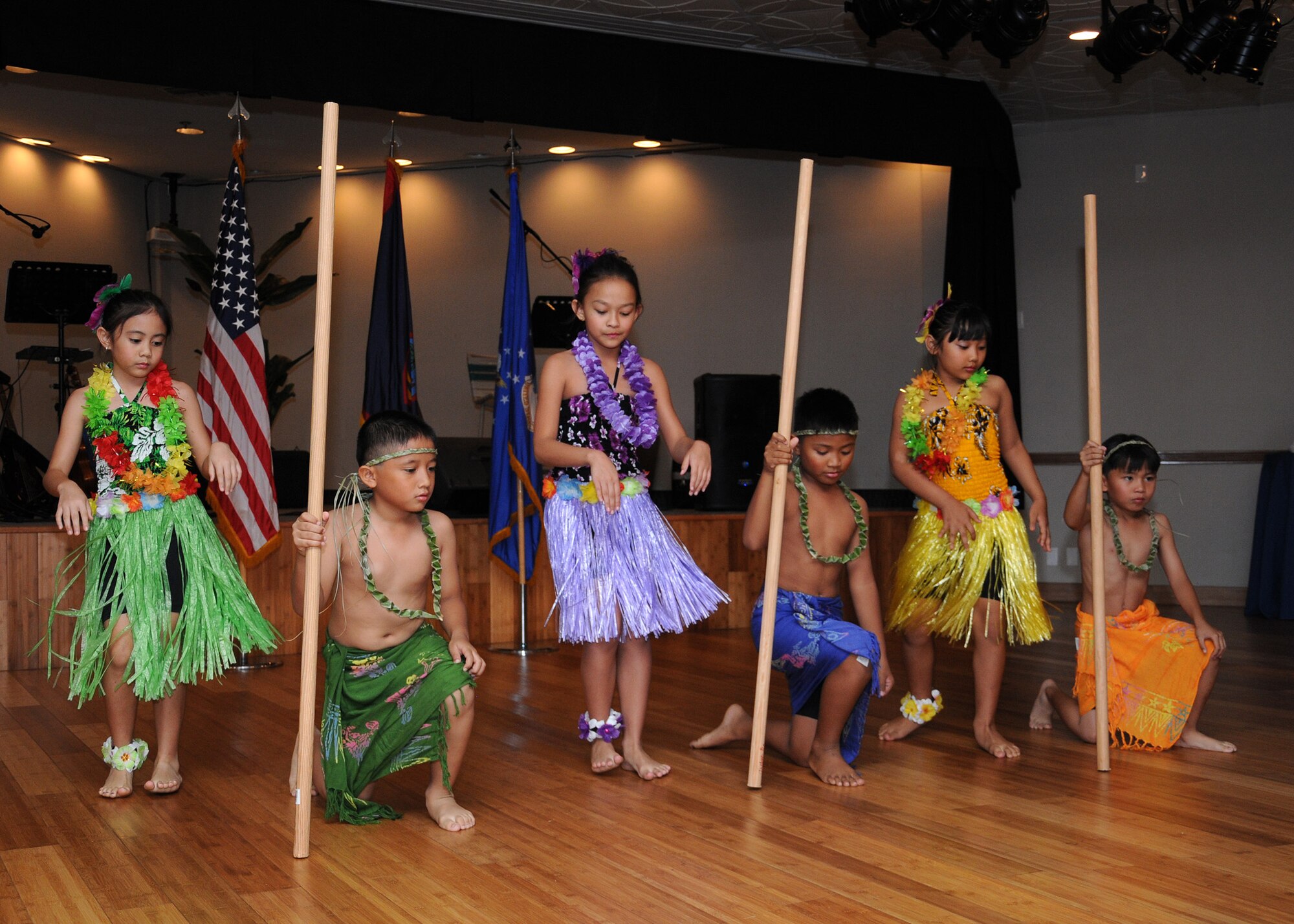 Dominican Catholic School students provide a traditional Chamorro dance presentation during the National Prayer Luncheon on Andersen Air Force Base, Guam, March 22, 2013. More than 220 Team Andersen members attended the annual event where Chap. (Col.) Dondi Costin, Pacific Air Forces chaplain, was the guest speaker. (U.S. Air Force photo by Staff Sgt. Melissa B. White/Released)