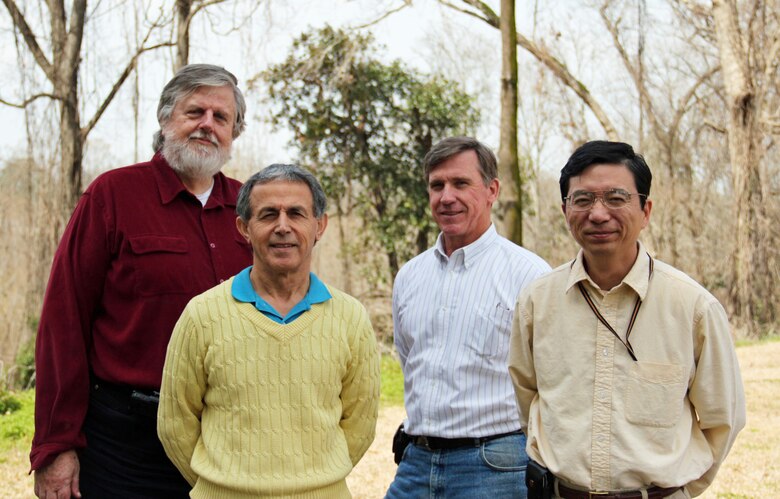 (From left to right) Dr. David King, Zeki Dmemirbilek, Don Ward and Lihwa Lin, are the team members performing the computer modeling efforts in Vicksburg, Miss. The end result will assist Norfolk District engineers with designing a jetty that will maximize the benefits within the alloted $3.6 million to design and build it for the residents Tangier, Va.