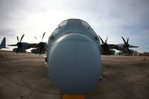 A C-130 Hercules on Cherry Point waits on the flight line at Marine Corps Air Station Cherry Point, N.C., before a training mission March 20, 2013. The aircraft would carry Marines from Marine Corps Air Station New River, N.C., over Camp Lejeune, N.C., where they would leap into the skies to meet their quarterly fleet requirement.