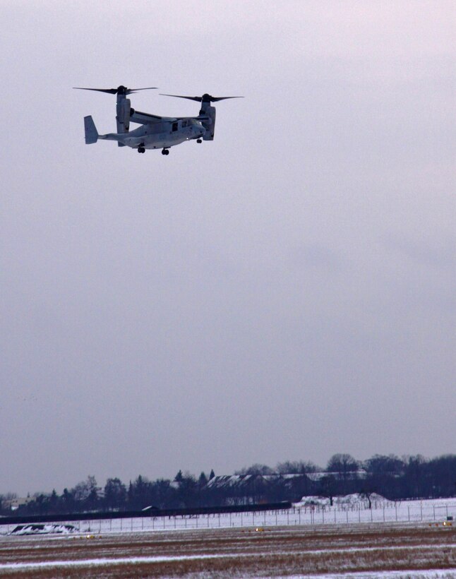 An MV-22B Osprey assigned to the Marine Medium Tiltrotor Squadron 266 (Reinforced), 26th Marine Expeditionary Unit, II Marine Expeditionary Force, Camp Lejeune, N.C., approaches the Stuttgart Army Airfield to prepare for a capabilities demonstration, scheduled for the next few days in Stuttgart, Germany. The MV-22B Osprey has a unique tilt-rotor capability that allows it to fly twice as fast, twice as high, and six times farther than legacy medium-lift helicopters, while carrying three times more weight.