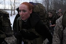 Megan Jones, 22, from Bloomington, Minn., walks next to her brother Pfc. Michael Jones, a 2012 Jefferson High School graduate, during a five-mile morning hike March 23. Megan is currently in Recruiting Station Twin Cities' Delayed Entry Program and will ship to boot camp April 8. Michael completed boot camp Oct. 19, 2012. For additional imagery from the event, visit www.facebook.com/rstwincities. 
