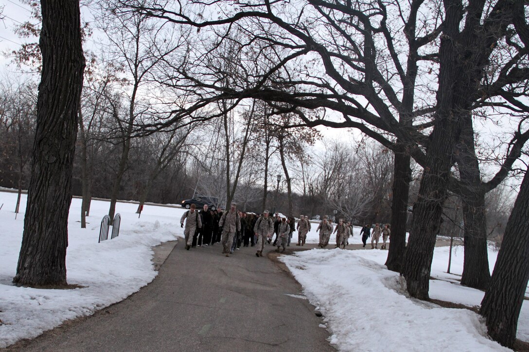 Marines with Recruiting Station Twin Cities lead a group of aspiring Lady Leathernecks on a five-mile morning hike March 23 to prepare them for boot camp. Many of the hike participants are currently in the Delayed Entry Program and will ship to boot camp later this year. For additional imagery from the event, visit www.facebook.com/rstwincities.   