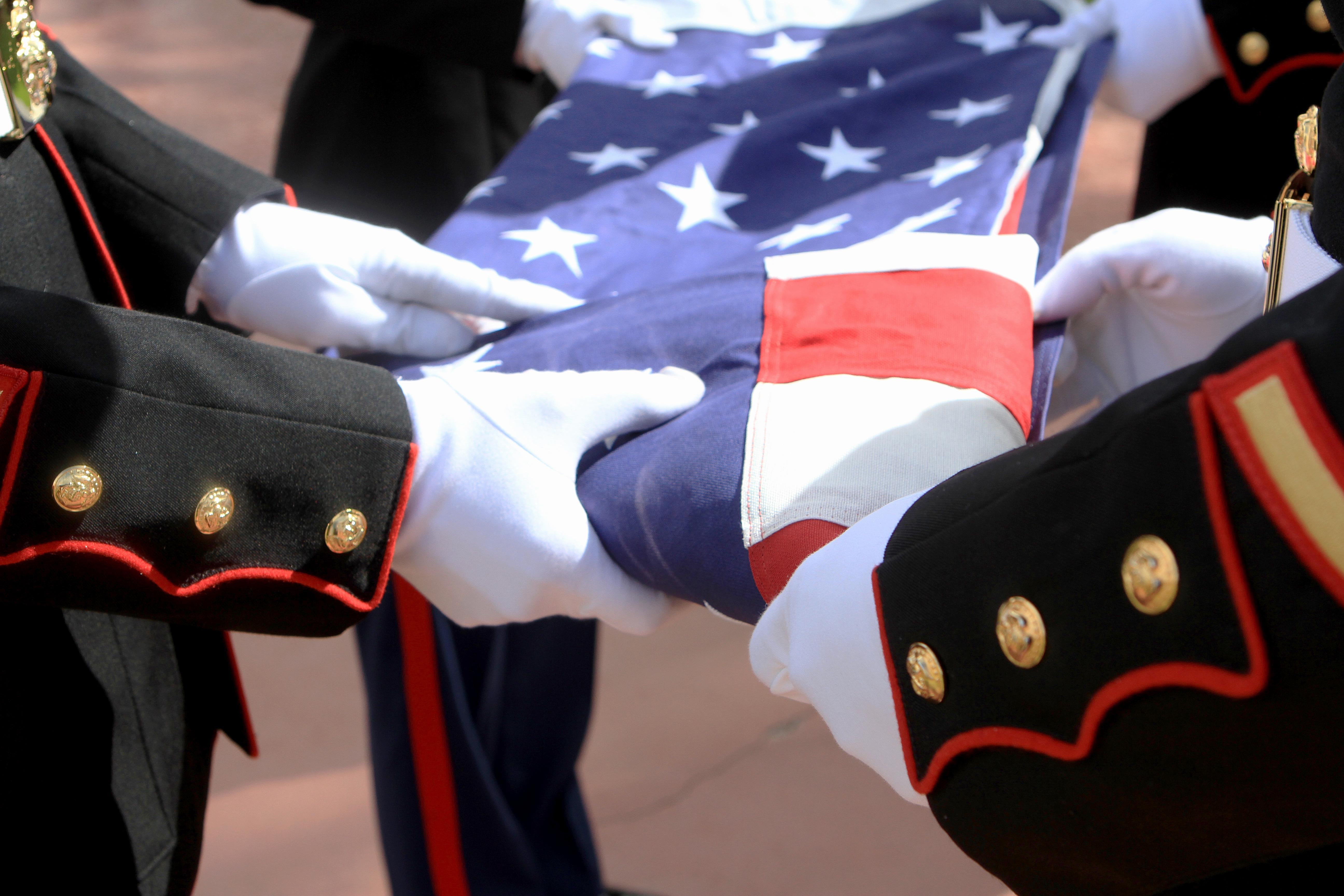 Folding american 2025 flag at funeral