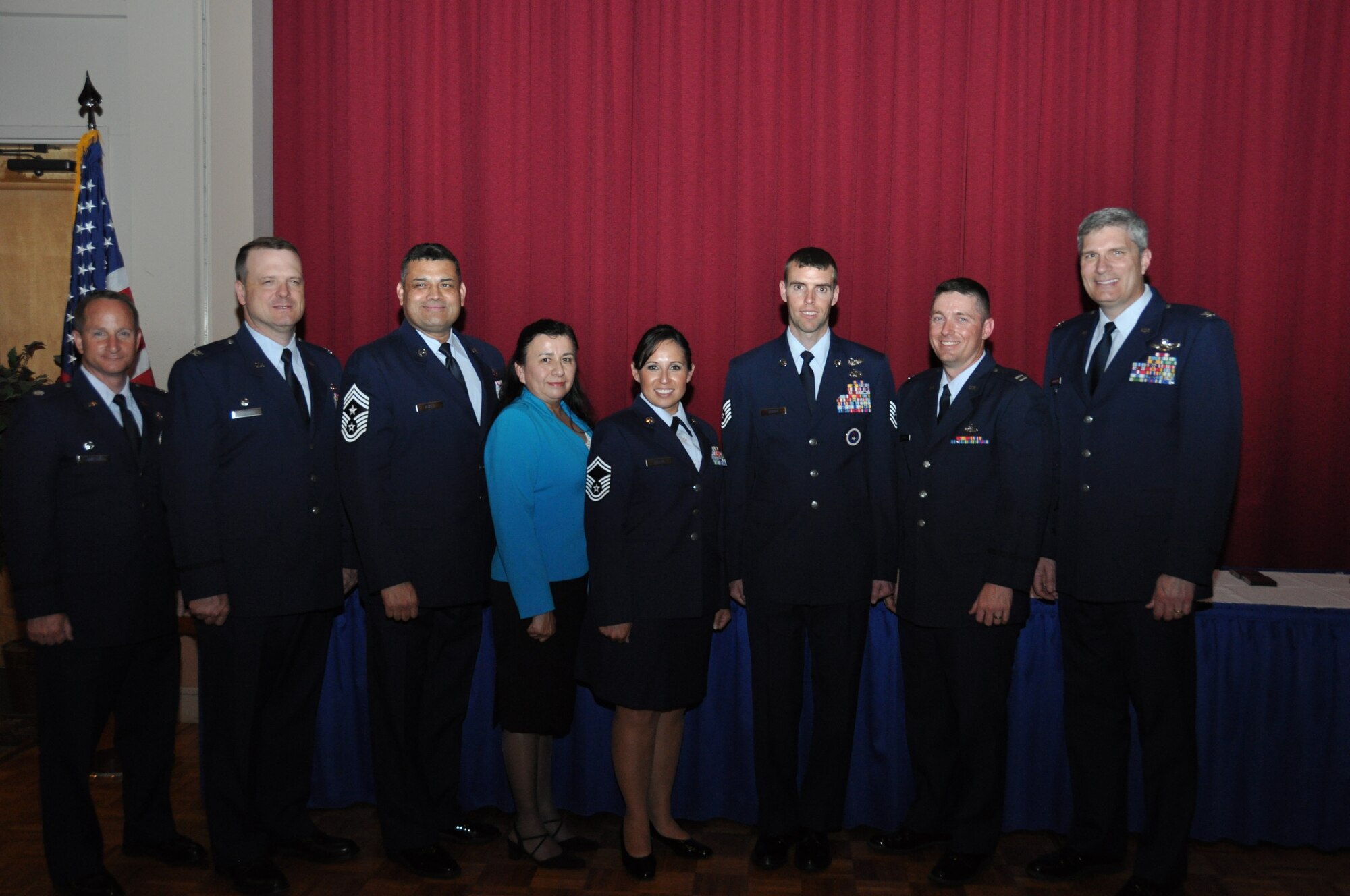 Senior Leadership join 433rd Airlift Wing Air Force Association's award winners, (left to right, center in blue) Ms. Julia Valderas, 433rd Logistics Squadron; SMSgt Lisa Deleon, 433rd Airlift Control Squadron; TSgt Michael Senigo, 733rd Training Squadron and Capt. Wallace Collins, 433rd Airlift Wing.

433rd AW senior leadership (Far Left) Lt. Col. John Martino, 733rd Training Squadron commander; Col. Craig Petersen, 433rd Mission Support Group commander; CMSgt Emil Garza, 433rd Command Chief and (Far right) Col. Aaron Vangelisti, 433rd Vice commander