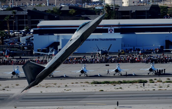An F-22 Raptor performs a max climb take off during the 2010 Aviation Nation Nellis Open House Nov. 12. The Nellis Open House is an opportunity for the Las Vegas community to view aerial demonstrations and static displays of various aircraft from the military. The open house also acts as the final air show of the year for the U.S. Air Force Aerial Demonstration Squadron Thunderbirds. (U.S. Air Force photo/ Master Sgt. Kevin J. Gruenwald) 




