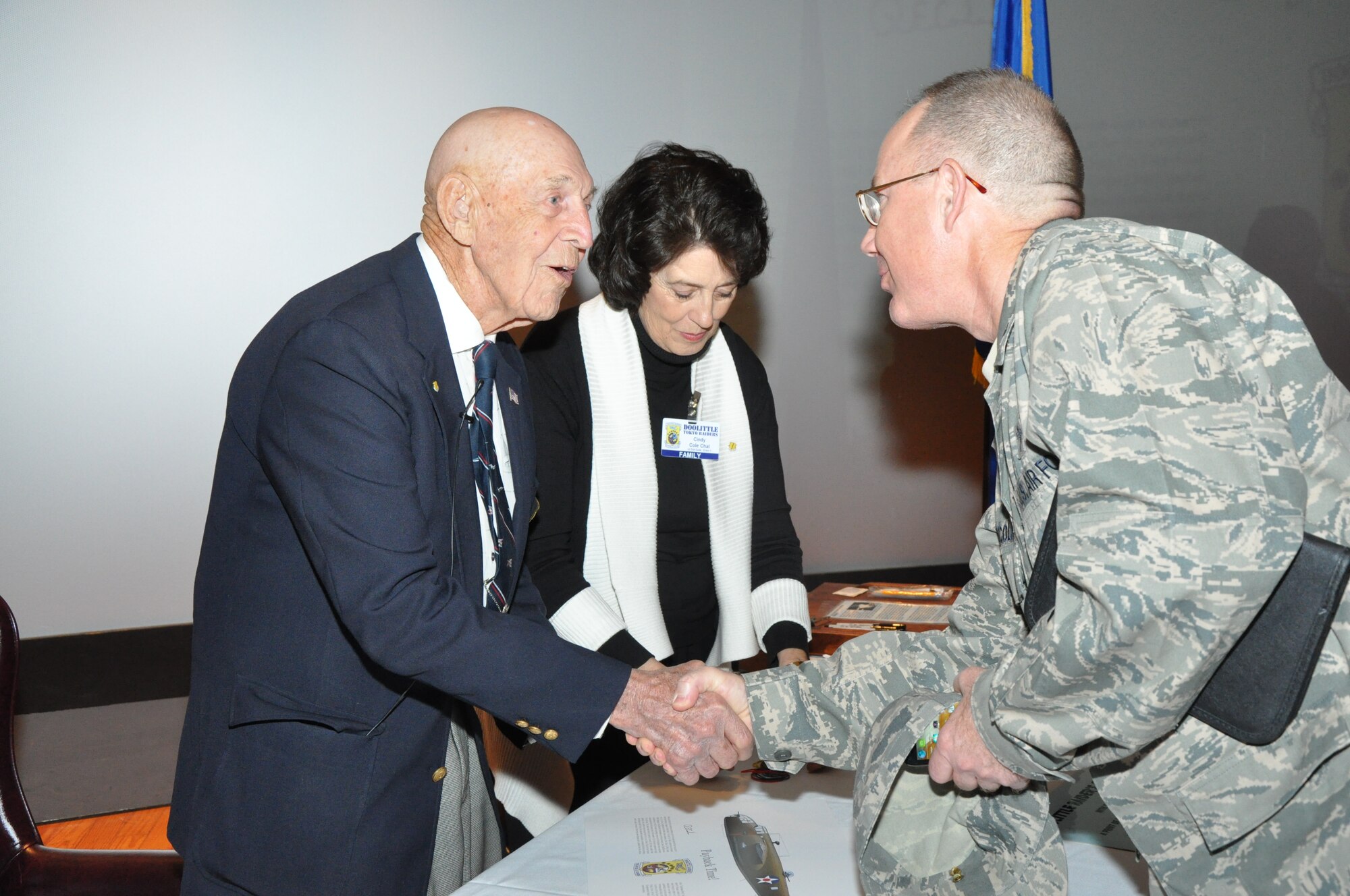 GOODFELLOW AIR FORCE BASE, Texas—U.S. Army Air Force retired Lt Col. Richard Cole, Doolittle Raider, meets Wing Chaplain Steven Nicolai at the base theater after a question and answer session, March 26. Cole is one of four remaining Doolittle Raiders. (U.S. Air Force photo/1st Lt. Leanne Hedgepeth)  