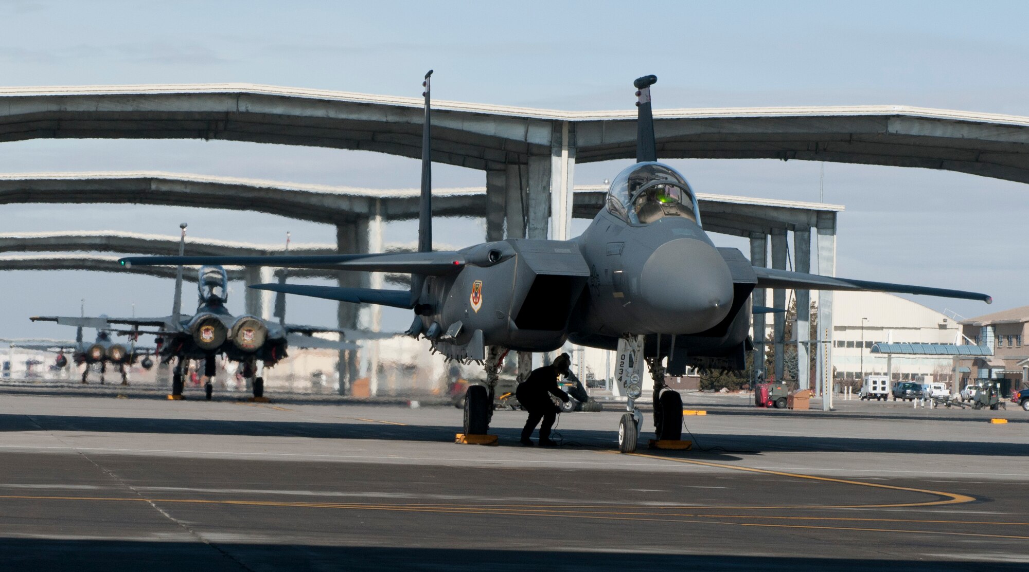 A U.S. Air Force Airman finishes pre-flight checks on an F-15E Strike Eagle, Feb. 28, 2013, at Mountain Home Air Force Base, Idaho. Crew chiefs must be thorough when completing pre-flight checks as the lives of the aircrew could depend on the accuracy of these inspections. (U.S. Air Force photo/Senior Airman Heather Hayward)