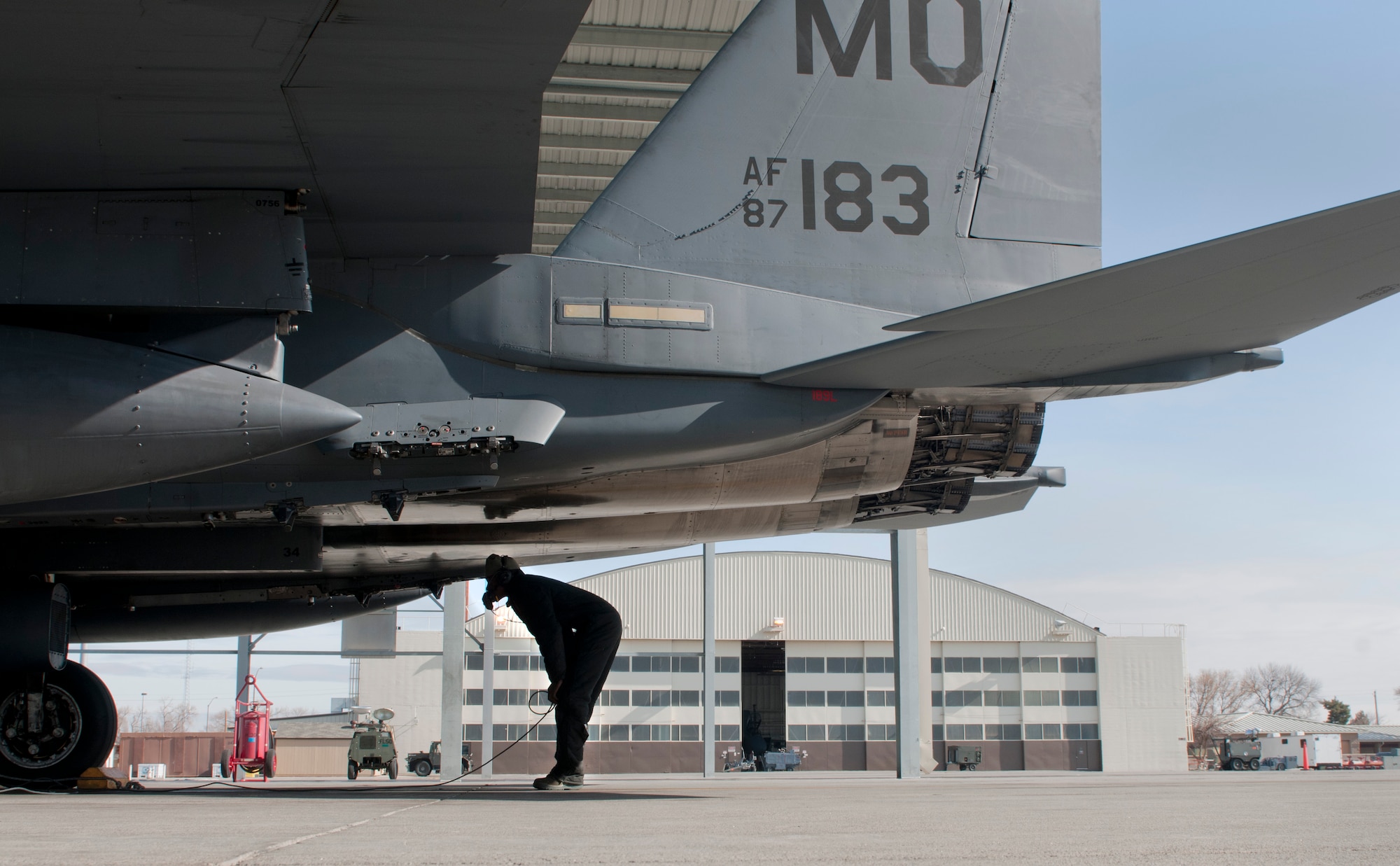 U.S. Air Force Airman 1st Class Emmanuel Osagiede, 389th Aircraft Maintenance Unit crew chief, awaits direction from the aircrew to complete the remainder of his pre-flight checks, Feb. 28, 2013, at Mountain Home Air Force Base, Idaho. When aircrews step into the aircraft, they must trust that maintainers have conducted a careful safety inspection of the aircraft and that the jet is ready for flight. (U.S. Air Force photo/Senior Airman Heather Hayward)