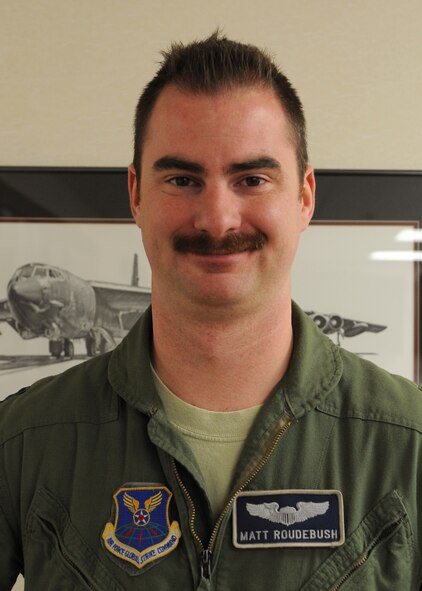 Capt. Matthew Roudebush is a Mustache March participant from the 20th Bomb Squadron. Mustache March in the Air Force originated in 1965, when then Col. Robin Olds decided to grow out his mustache during a deployment to Vietnam. Aircrew members and Airmen keep the tradition going by growing their mustaches out every March. (U.S. Air Force photo/Airman 1st Class Benjamin Gonsier)