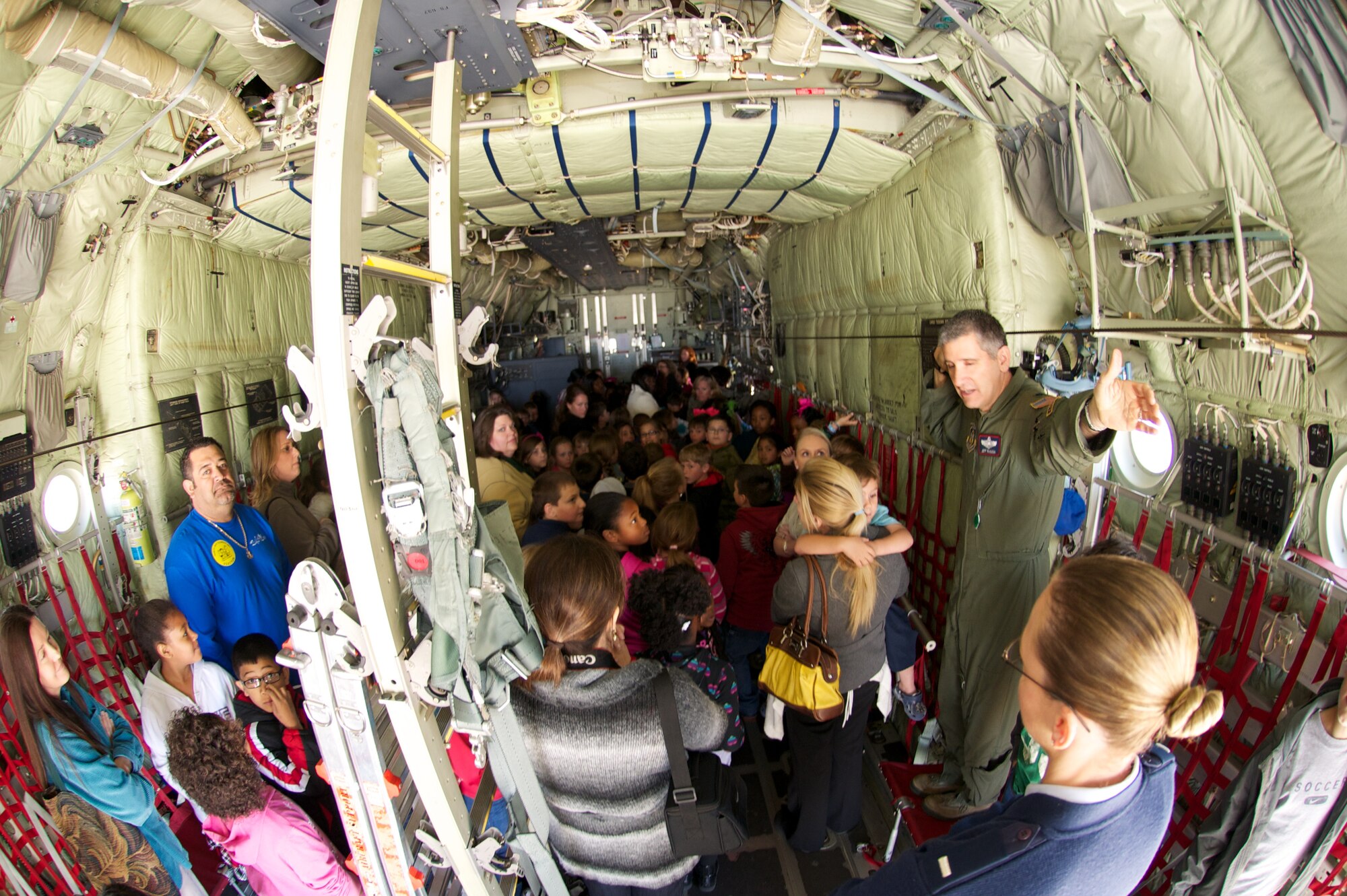 Third graders from North Bay Elementary toured 403rd Wing facilities March 25 to expand their horizons about the Air Force Reserve's flying missions here. They concluded their tour with a walkthrough of a WC-130J aircraft (US Air Force photo illustration by Capt. J. Justin Pearce). 