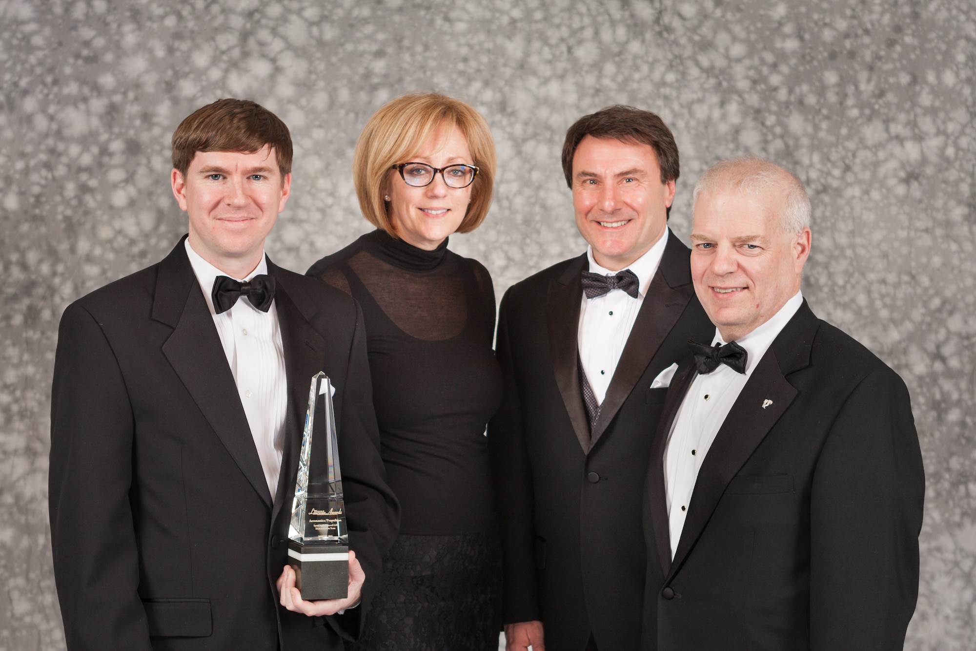 Air Force Research Laboratory's Speed Agile team was honored with the Aviation Week Laureate award for Aeronautics/Propulsion on March 7 in a ceremony in Washington, D.C.  Team members include (left to right): Cale Zeune (AFRL), Peri Widener (Boeing), Barth Shenk (AFRL) and Al Romig (Lockheed Martin). (Contributed Photo)