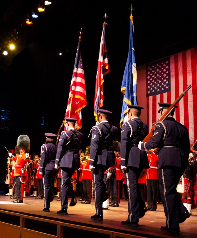 Members of the Patrick Air Force Base Honor Guard post the colors to start the performance of the Pipes and Drums of the Black Watch and the Band of the Scots Guards at the King Center in Melbourne, Fla., March 23.  (Photo by Matthew Jurgens)