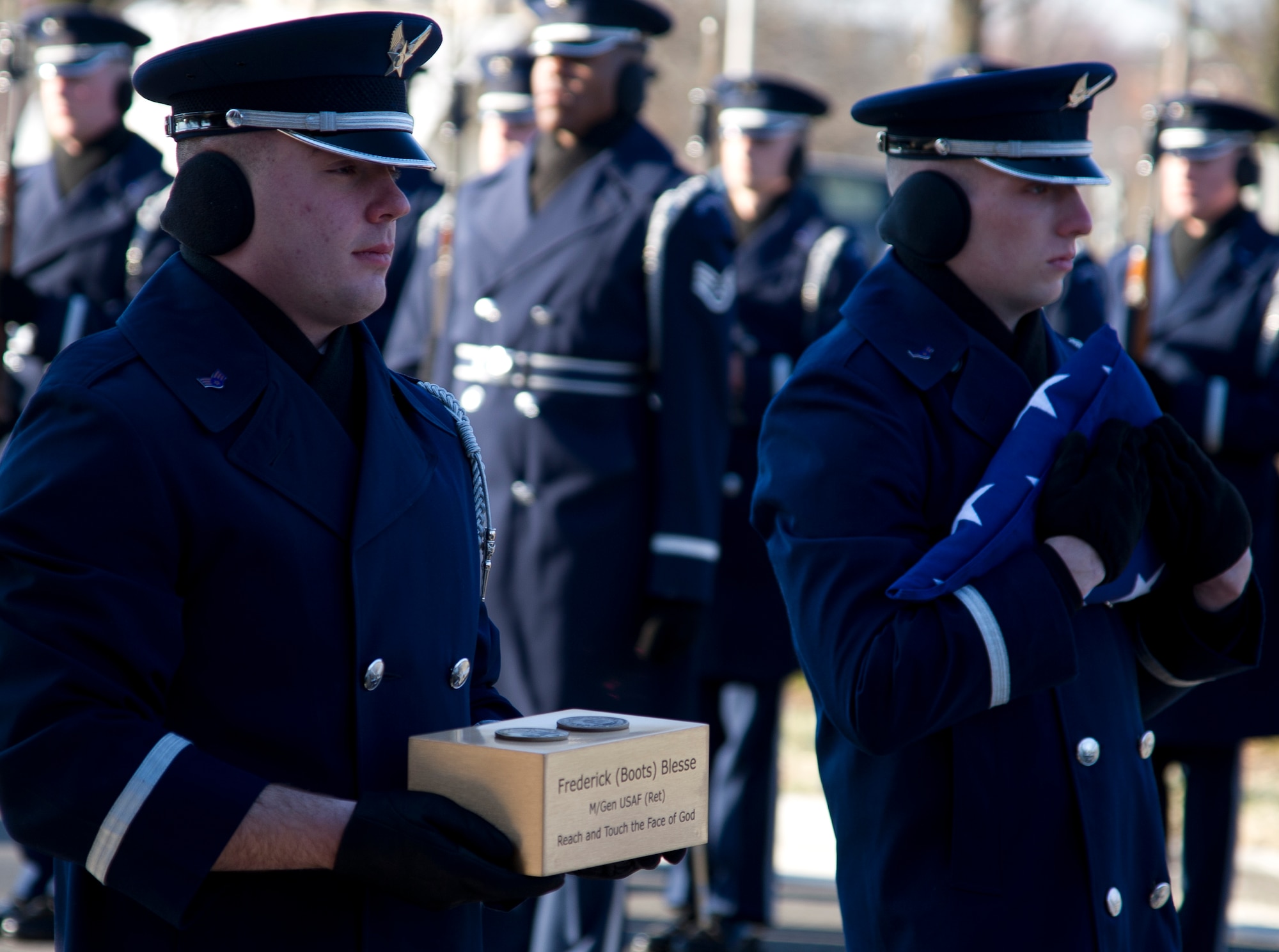 U.S. Honor Guard members escort retired Maj. Gen. Frederick "Boots" Blesse’s remains into the chapel March 22, 2013, at Arlington National cemetery in Arlington, Va. Blesse, was a command pilot with more than 6,500 flying hours, most of which have been in fighter aircraft including the P-40, P-47, P-51 Mustang, P-80, F-86, F-100, F-102, F-104, F-106, F-4, F-111 and F-15. At the time of his death, he had more than 650 hours combat flying and was the nation's sixth ranking jet ace. (U.S. Air Force photo/ Staff Sgt. Perry Aston)