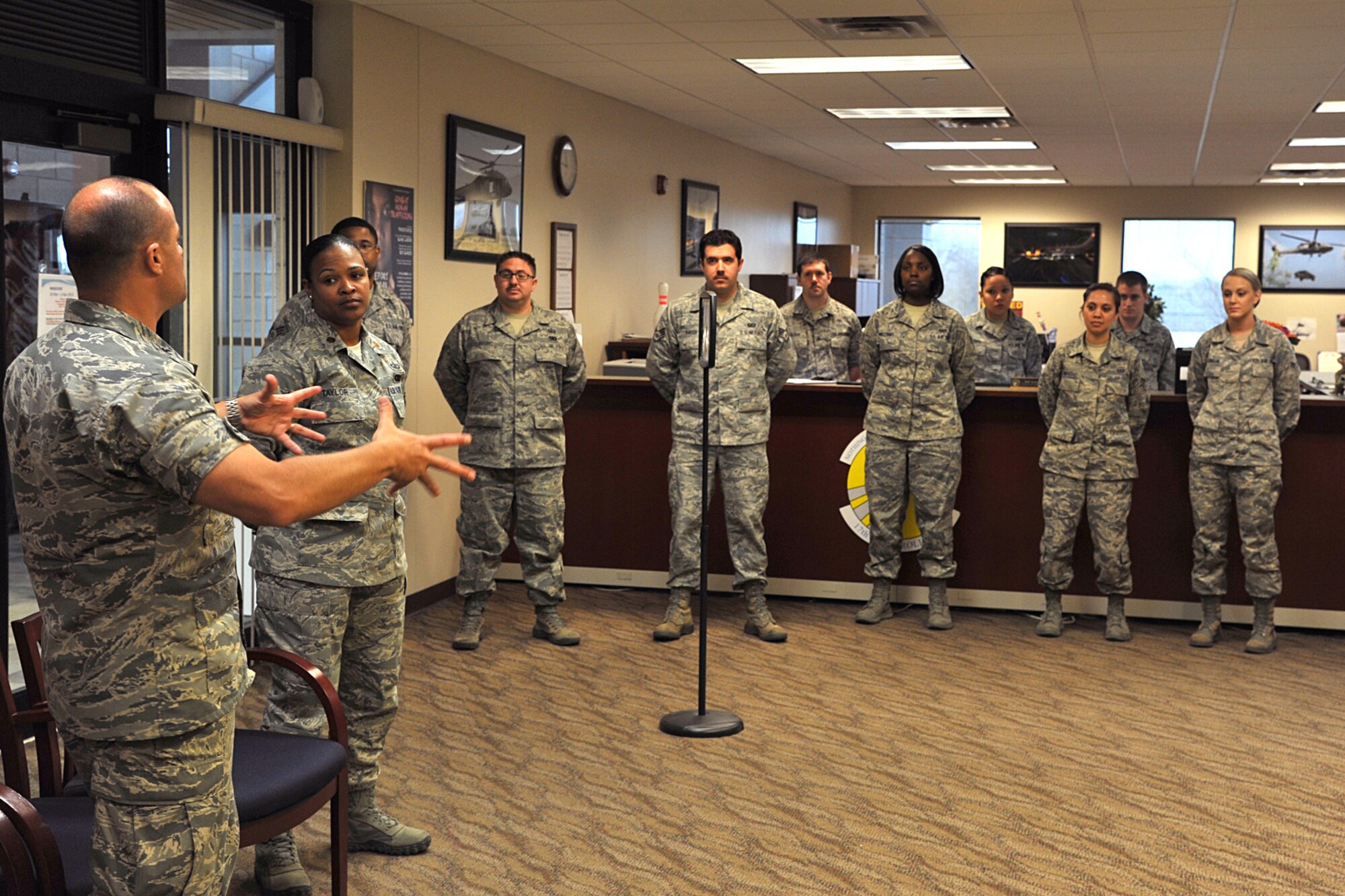 GOODFELLOW AIR FORCE BASE, Texas -- Col. Mark Damiano, 17th Training Wing Commander, thanks the 17th Comptroller Squadron for their hard work and encourages them to continue doing a great job, March 22. Damiano did a walk though of several squadrons on Goodfellow to show appreciation to individuals and their coworkers. (U.S. Air Force photo/ Airman 1st Class Michael Smith)