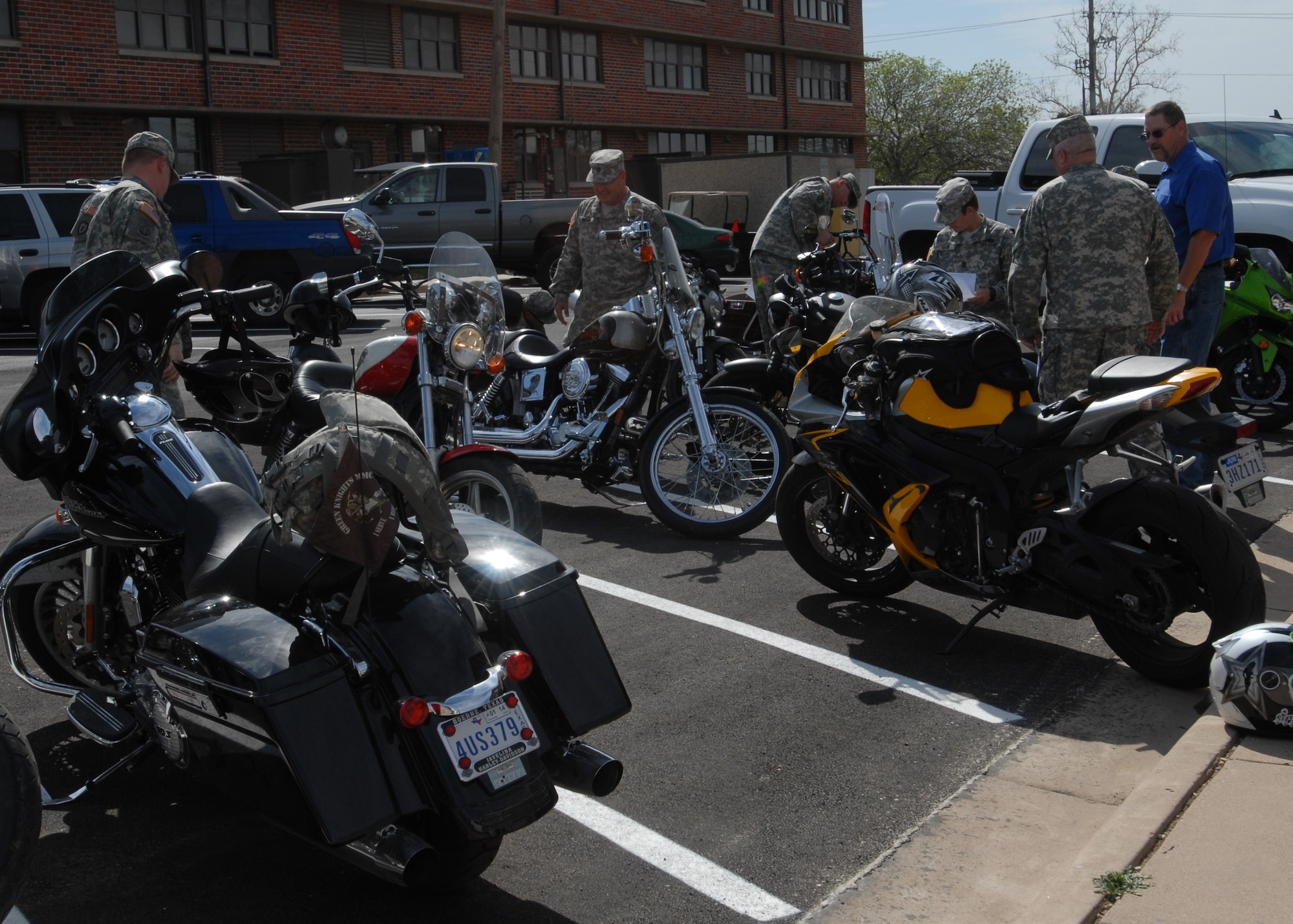 GOODFELLOW AIR FORCE BASE, Texas – Motorcycle safety class inspects their motorcycles at the Army battalion before training on the flight line and going out for an off-post ride March 22.  This maintenance checklist is one of the ways to practice safety awareness when riding motorcycles.  (U.S. Air Force photo/ Airman 1st Class Breonna Fields)