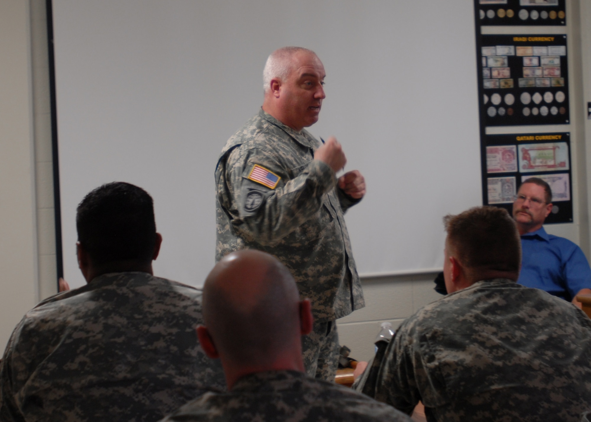 GOODFELLOW AIR FORCE BASE, Texas – Army Sgt. 1st Class Jay S. Kelly, Army 344th Military Intelligence Battalion motorcycle safety NCO, emphasizes the importance of wearing reflective vests while riding motorcycles during a motorcycle training course, March 22, at the Army Battalion here.  The class took place to emphasize safety awareness and precautions when riding with and around other vehicles. (U.S. Air Force photo/ Airman 1st Class Breonna Fields)