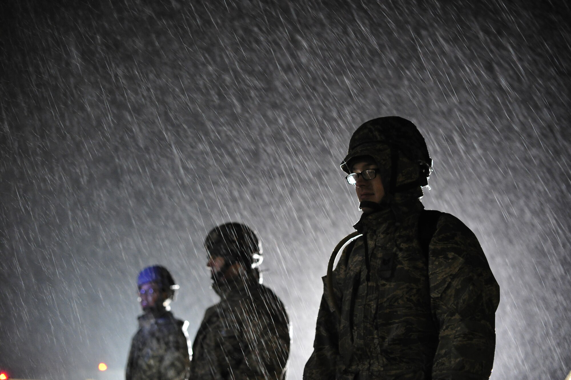 JOINT BASE MCGUIRE-DIX-LAKEHURST, N.J. -- U.S. Air Force Airmen assigned to the 621st Contingency Response Wing at JB MDL, build tents to sleep in on the first night of their participation in Exercise Eagle Flag 13-2 at Lakehurst.  Approximately 150 Airmen from the CRW and U.S. Army Soldiers from the 690th Rapid Port Opening Element, based at Joint Base Langley-Eustis, Va., were part of U.S. Transportation Command Joint Task Force validation exercise March 18 to 22, 2013. (U.S. Air Force photo by Tech. Sgt. Parker Gyokeres/Released)