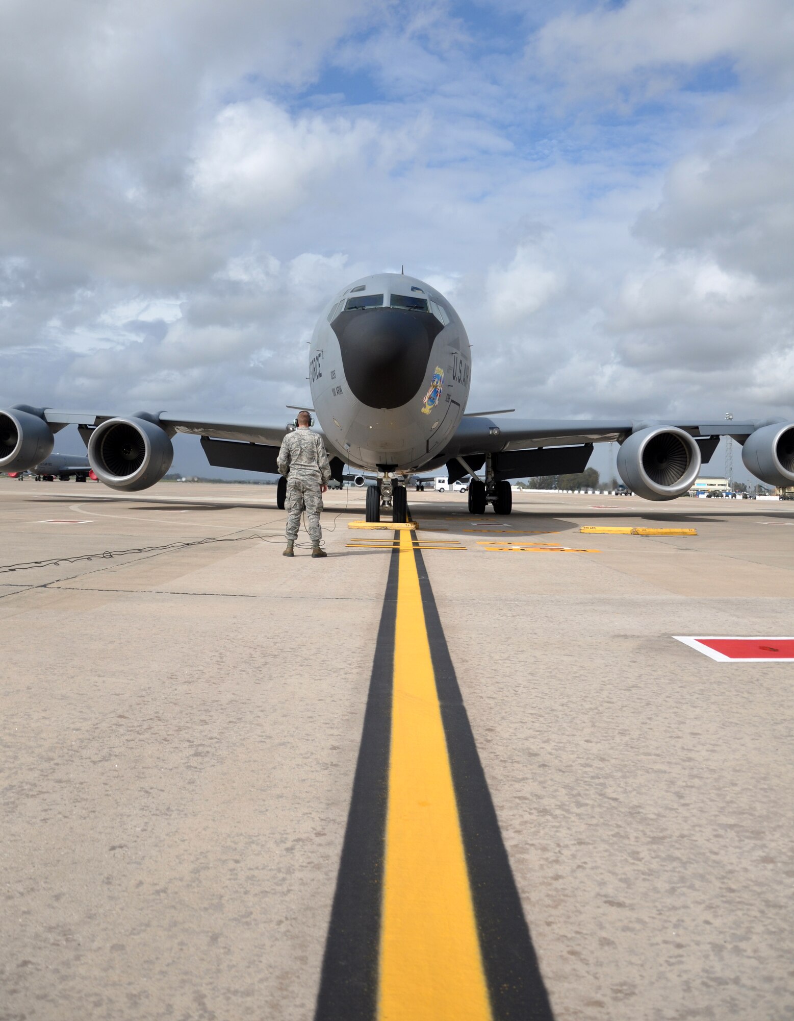 Airman 1st Class Colton Williams, 100th Aircraft Maintenance Squadron, talks with an aircrew of a KC-135 Stratotanker through the intercom after a mission March 25, 2013. Airmen and aircraft deployed from the 100th Air Refueling Wing, RAF Mildenhall, England, to southwest Europe as the 351st Expeditionary Air Refueling Squadron Jan. 26, 2013. The 351st EARS has completed more than 120 sorties supporting French fighter aircraft conducting operations in Mali. The sorties include more than 5.5 million pounds of fuel transferred. (U.S. Air Force photo by Capt. Jason Smith)