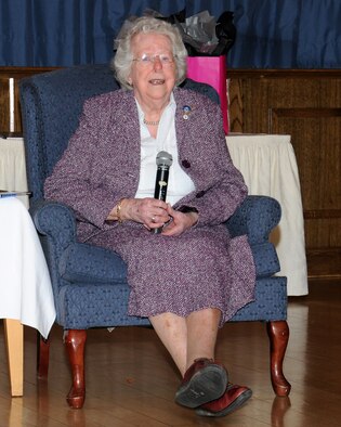 Jean Patterson speaks about her time in the Royal Air Force March 22, 2013, at RAF Mildenhall, England. Patterson entered the Royal Air Force as a tailor repairing parachutes. She was trained as an electrician, working in a male-dominated shop with only five other women. Until then, only administrative and traditionally female positions were open to women. But, with the ramp up of wartime operations, more able bodies were needed in support positions, therefore opening the doors to women previously closed. (U.S. Air Force photo by Gina Randall/Released)