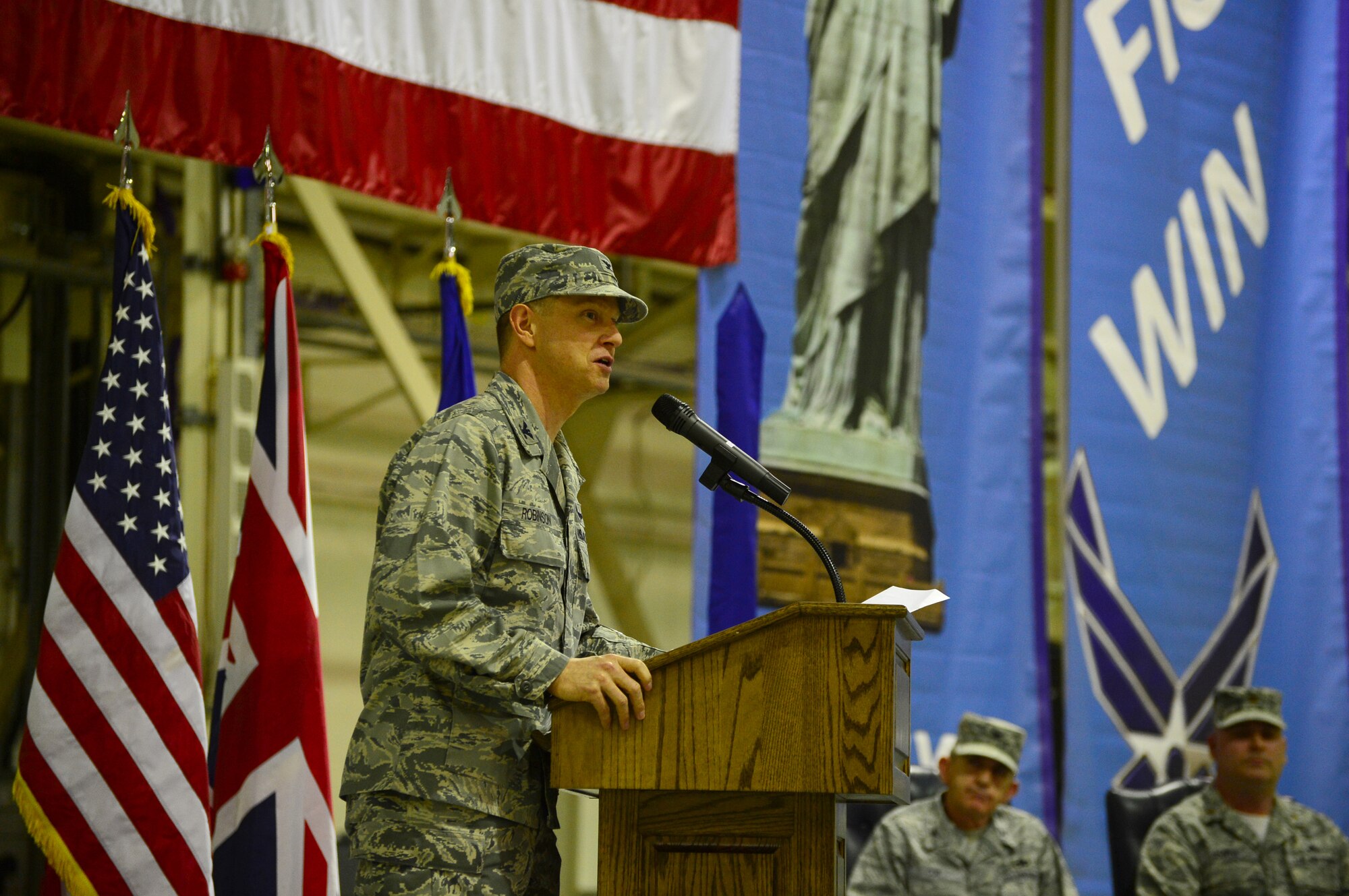 ROYAL AIR FORCE LAKENHEATH, England -- Col. Kyle Robinson, 48th Fighter Wing commander, gives the closing remarks during the 48th Maintenance Operations Squadron inactivation ceremony held in Hangar 7 March 22, 2013. The inactivation is part of an Air Force ordered restructuring designed to boost the capabilities of wings. (U.S. Air Force photo by Airman 1st Class Dana J. Butler)