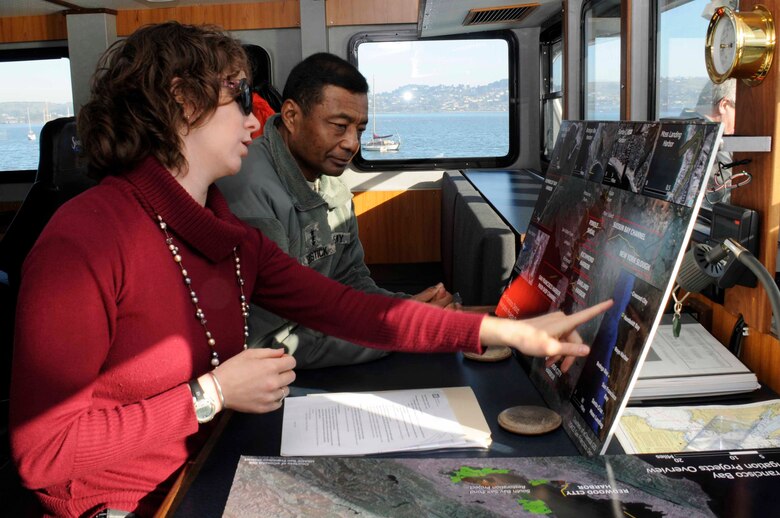 Jessica Burton Evans, San Francisco District Navigation Program Manager, briefs Lieutenant General Thomas P. Bostick, Commanding General and Chief of Engineers, on the district’s dredging and debris removal missions while aboard the MV John A.B. Dillard, Jr. during his visit to the district on Jan. 17.