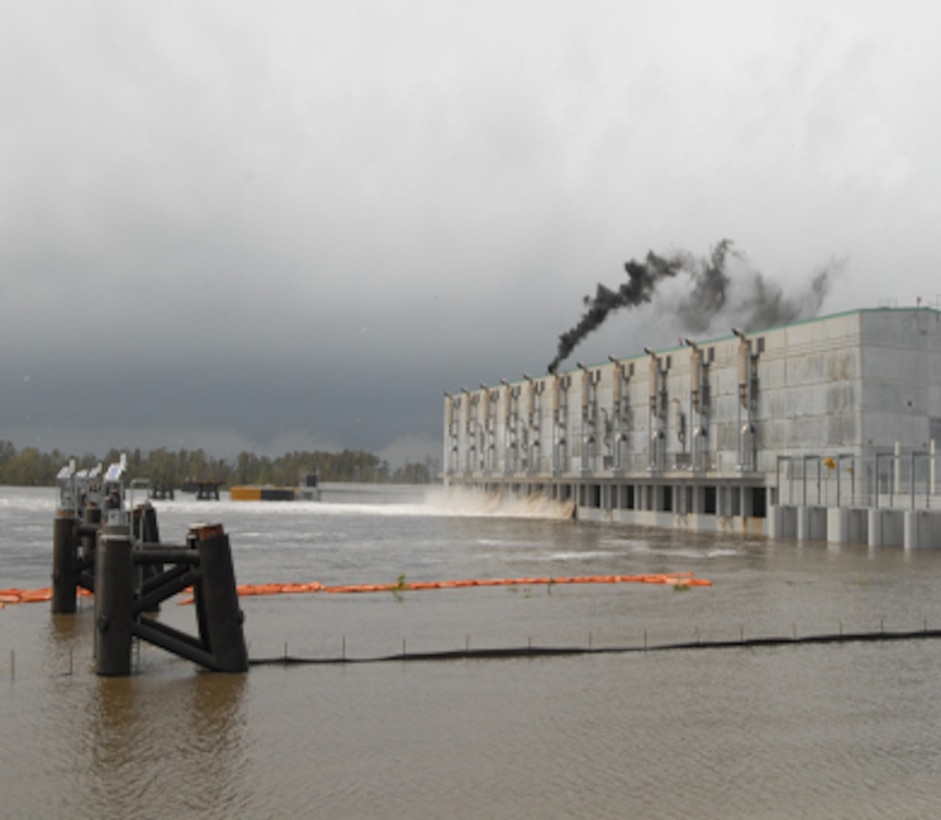The West Closure Complex in full form operating during Hurricane Isaac. Located approximately one half mile south of the confluence of the Harvey and Algiers canals on the Gulf Intracoastal Waterway, the approximately $1 billion project reduces the risk associated with storm surge for residences and businesses in three parishes on the west bank of the Mississippi River: Orleans, Jefferson and Plaquemines parishes.