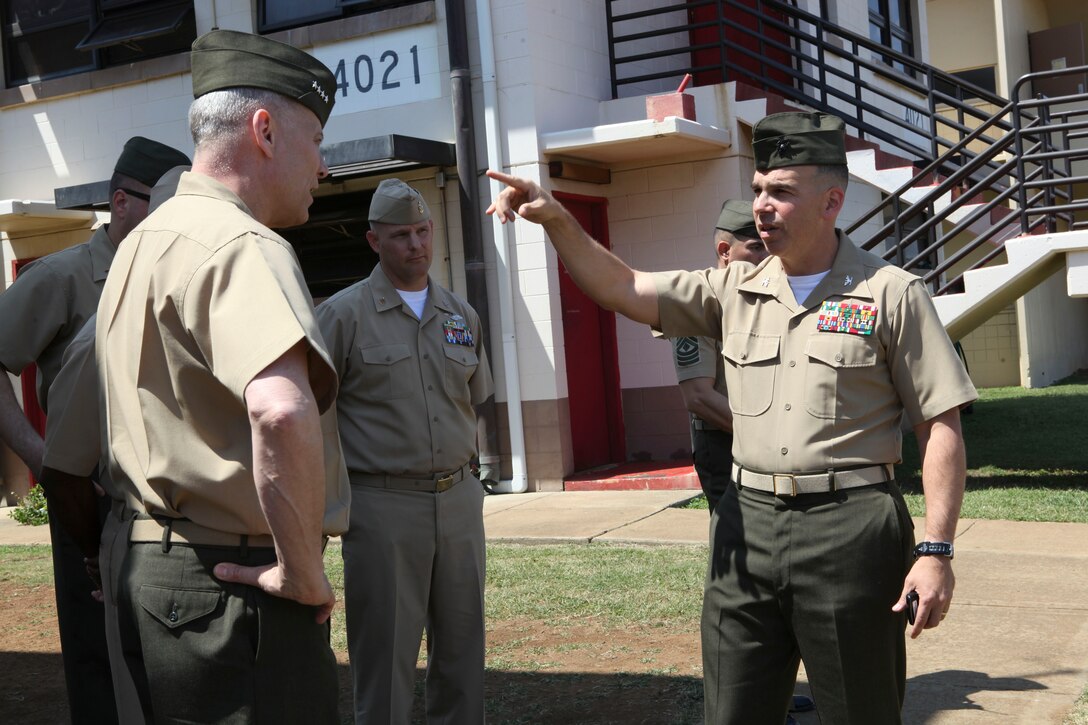 The Assistant Commandant of the Marine Corps, Gen. John M. Paxton, Jr., visits with Marines and Sailors from Third Marines Division, U.S. Marine Corps base Hawaii, March 8, 2013. The trip is part of a larger West Pacific trip. (U.S. Marine Corps photo by Cpl. Tia Dufour/Released)