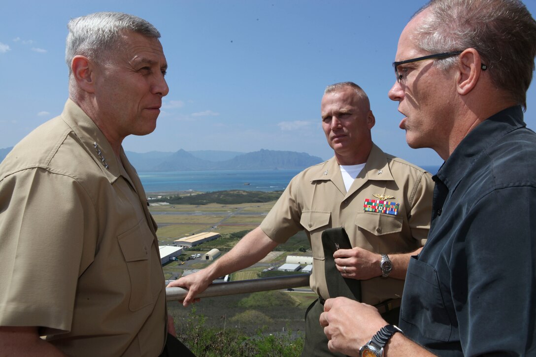 The Assistant Commandant of the Marine Corps, Gen. John M. Paxton, Jr., visits with Marines and Sailors from Third Marines Division, U.S. Marine Corps base Hawaii, March 8, 2013. The trip is part of a larger West Pacific trip. (U.S. Marine Corps photo by Cpl. Tia Dufour/Released)