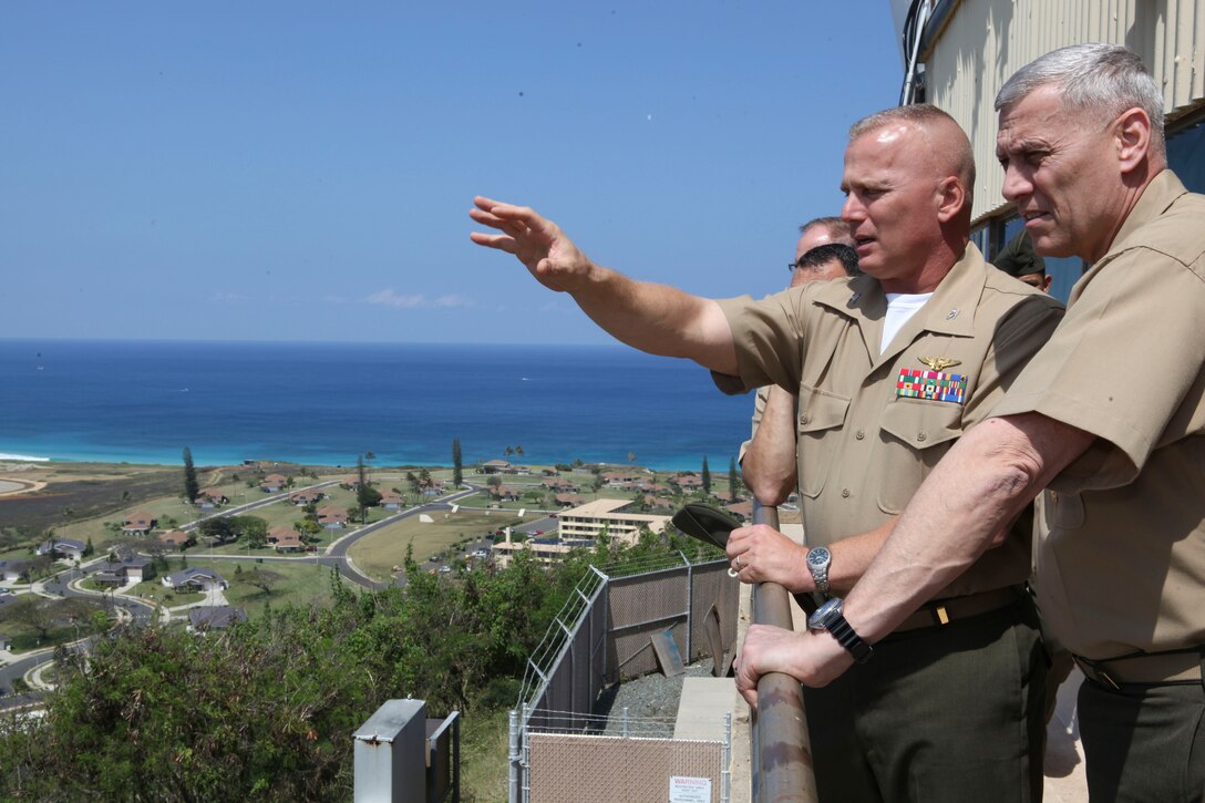 The Assistant Commandant of the Marine Corps, Gen. John M. Paxton, Jr., visits with Marines and Sailors from Third Marines Division, U.S. Marine Corps base Hawaii, March 8, 2013. The trip is part of a larger West Pacific trip. (U.S. Marine Corps photo by Cpl. Tia Dufour/Released)