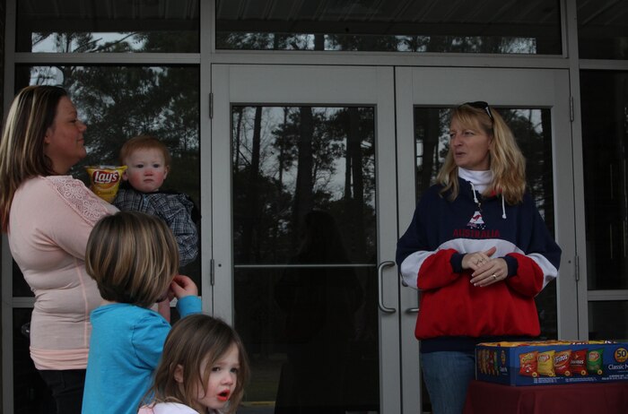 Mary C. Mathews (right),  the family readiness officer with Combat Logistics Battalion 6, 2nd Marine Logistics Group, and Danvers, Mass., native, speaks with the wife of a Marine following an Easter egg hunt aboard Camp Lejeune, N.C., March 23, 2013. Family members gathered for an opportunity to have fun while their Marines trained at Fort Pickett, Va. 