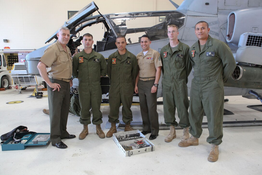 The Assistant Commandant of the Marine Corps, Gen. John M. Paxton, Jr., visits with Marines and Sailors from Third Marines Division, U.S. Marine Corps base Hawaii, March 8, 2013. The trip is part of a larger West Pacific trip. (U.S. Marine Corps photo by Cpl. Tia Dufour/Released)
