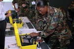An Airman tests equipment than can help identify potentially hazardous substances during Readiness Frontiers 2006 at the Snowbird Ski & Summer Resort in Utah on July 31, 2006.