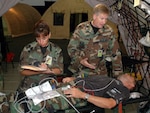 Airmen from the Missouri National Guard participated in an exercise simulating the National Guard's response during aftermath of a severe earthquake in Utah on July 31, 2006, during Readiness Frontiers 2006 at the Snowbird Ski & Summer Resort in Utah.