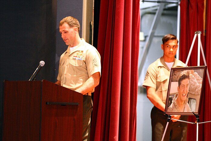 Staff Sgt. Mark Rawson, a team leader serving with Force Reconnaissance Company, 1st Reconnaissance Battalion, speaks during a memorial ceremony here, March 25, 2013. Staff Sgt. Caleb Medley, a reconnaissance man who served as a field radio operator with Force Reconnaissance Co., died during a skydiving training incident Feb. 26. Medley had a strong passion for physical fitness and always challenged his fellow Marines during physical training events.